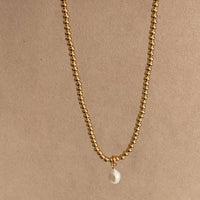 BELIEF NECKLACE & CELINE PEARL PENDANT