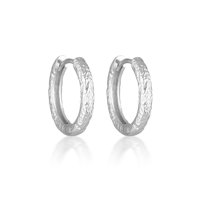 A pair of 15mm silver hoop earrings with an antique textured finish.